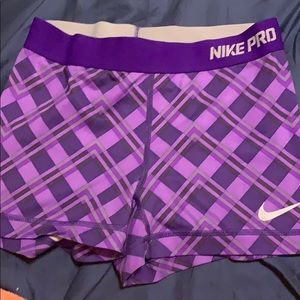 Purple Nike pros